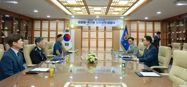 업무협약 체결 전 이동섭 국기원장과 조지호 경찰청장이 환담을 나누고 있다.(사진_경찰청)